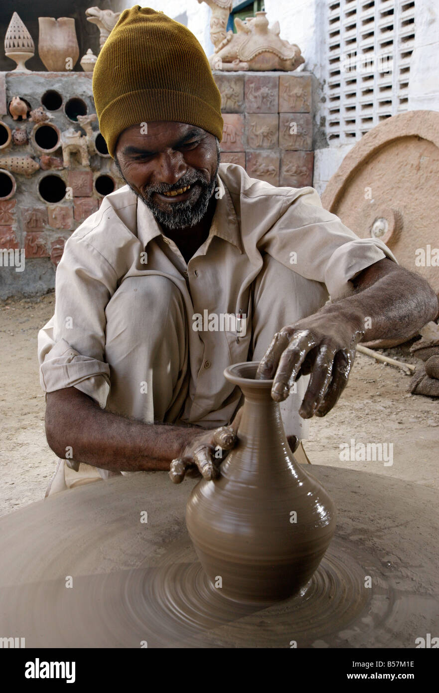 Village man using a potters wheel, Jodhpur, Rajasthan, India Stock
