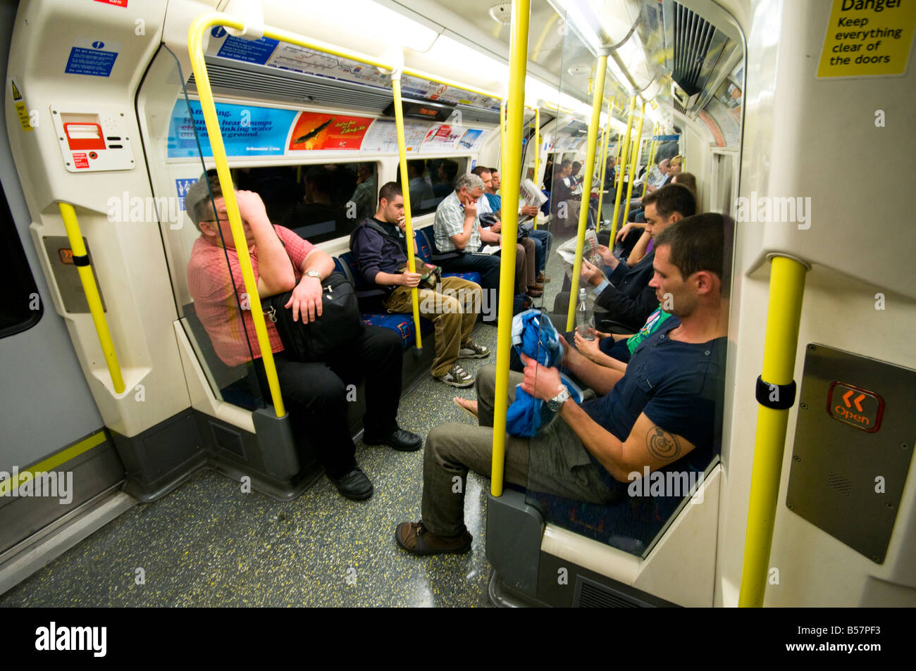 Passengers travelling on London Underground Train Stock Photo - Alamy