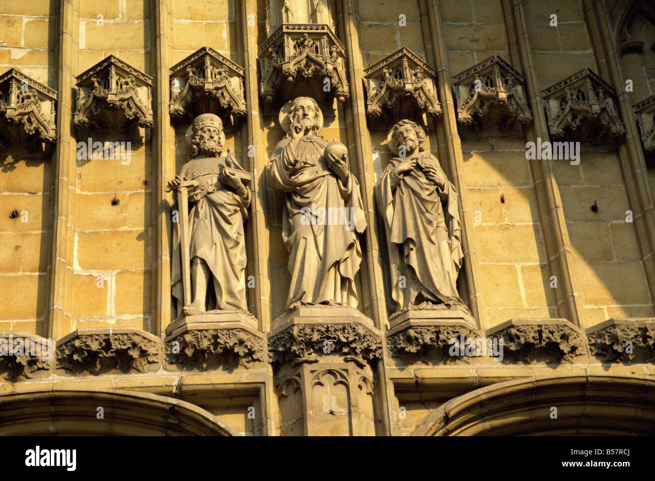 Religious statuary west door St Baafskathedraal Ghent Belgium Europe Stock Photo