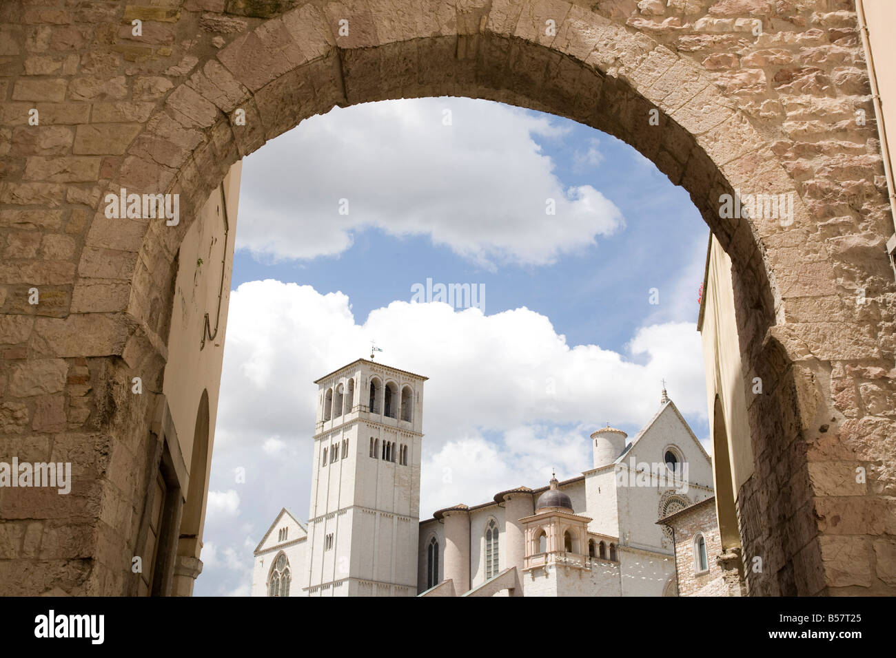 The New Gate Assisi and view of the Franciscan Basilica, UNESCO World Heritage Site, Assisi, Umbria, Italy, Europe Stock Photo