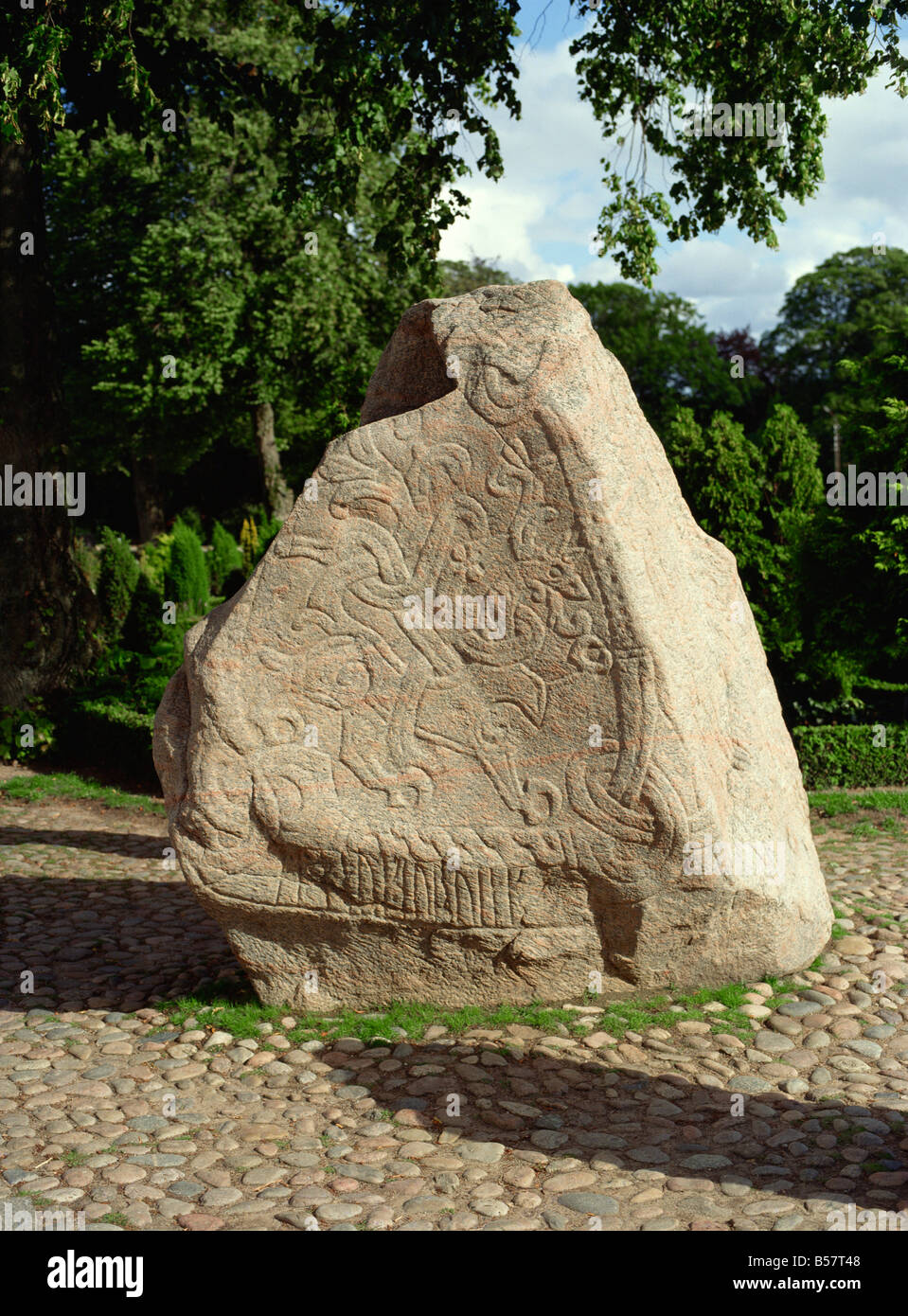 Rune stone referring to burials of Harald Blue Tooth, in Jelling churchyard, near Vejle, Central Jutland, Denmark, Scandinavia Stock Photo