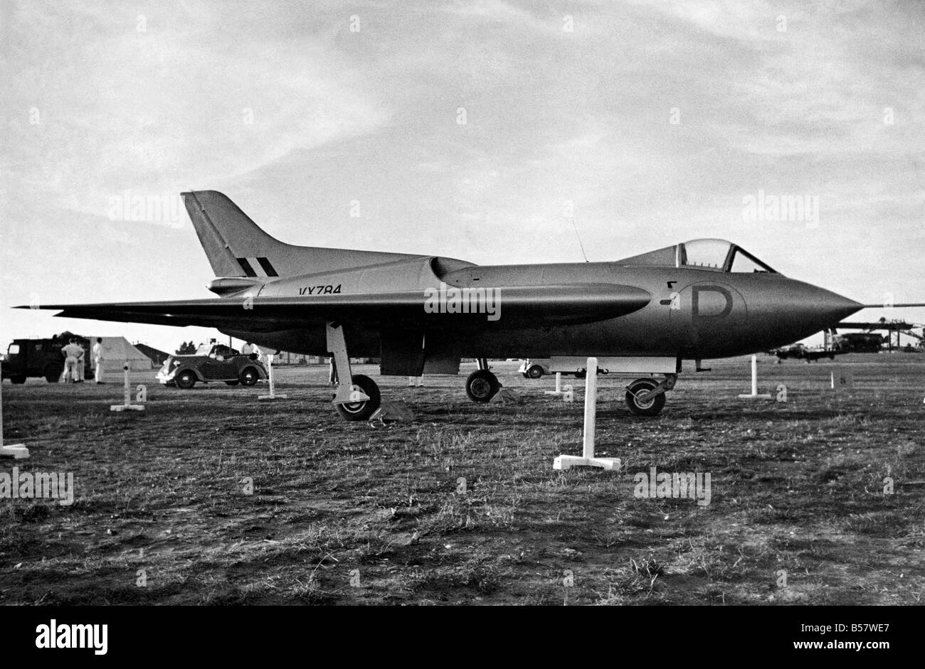 At the Society of British Aircraft Constructors' Flying Display at Farnborough, Hampshire, today a plane taken off the Secret List only this morning made a last minute appearance at 6.30 this evening. It was the Avro 707, an experimental jet propelled aircraft which flew across the airfield at a very high speed before landing. September 1949 P004658 Stock Photo