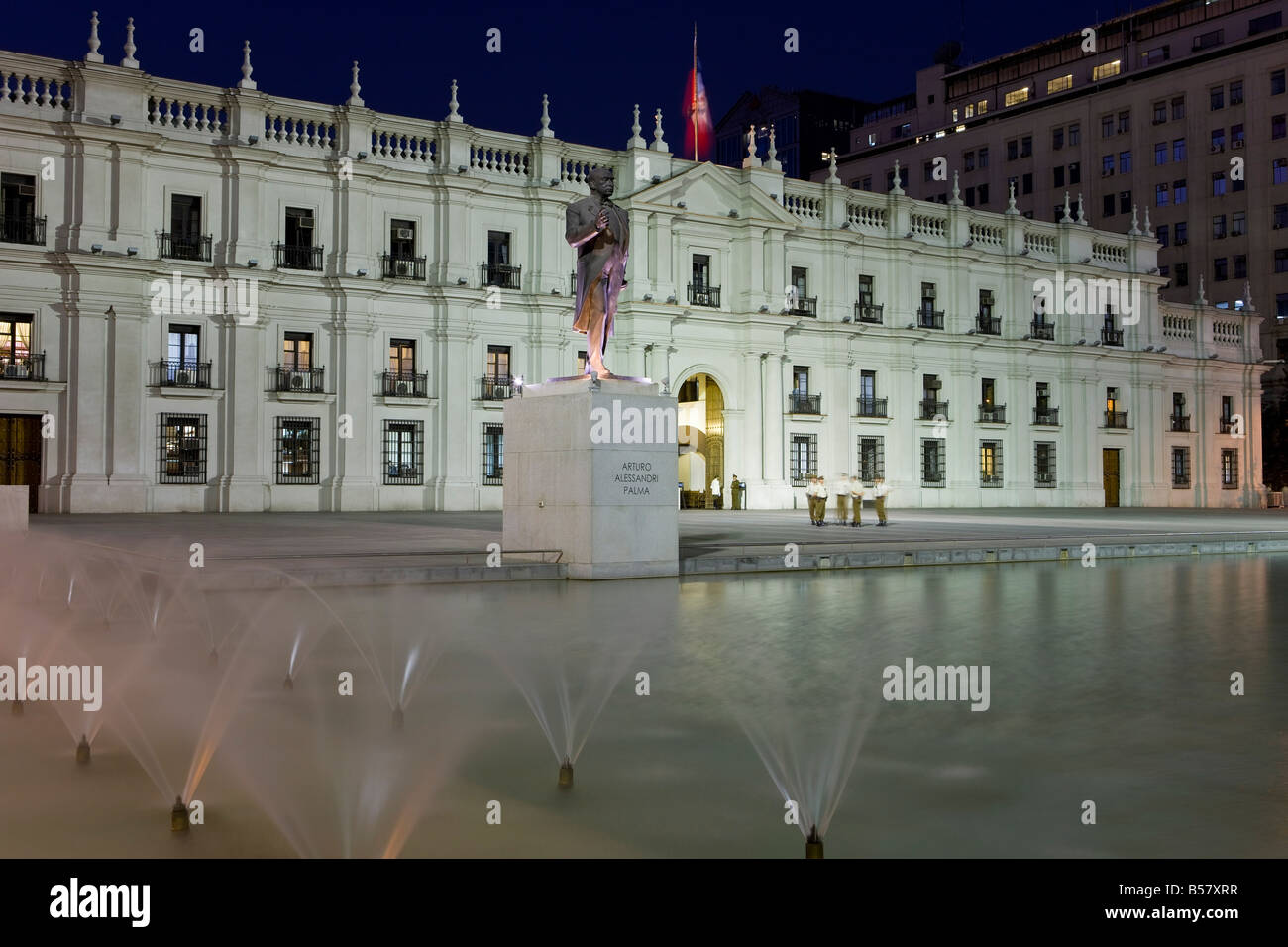 Palacio de la Moneda, Chile's presidential palace illuminated at dusk, Santiago, Chile, South America Stock Photo