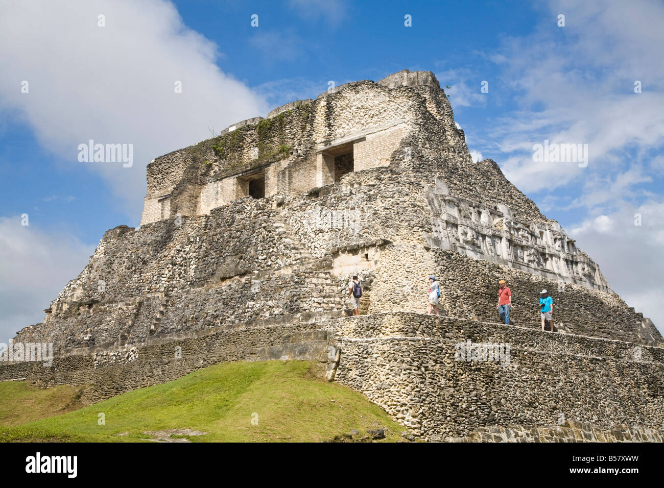 Tourists on the 130ft high El Castillo Xunantunich Ruins San Ignacio Belize Central America Stock Photo