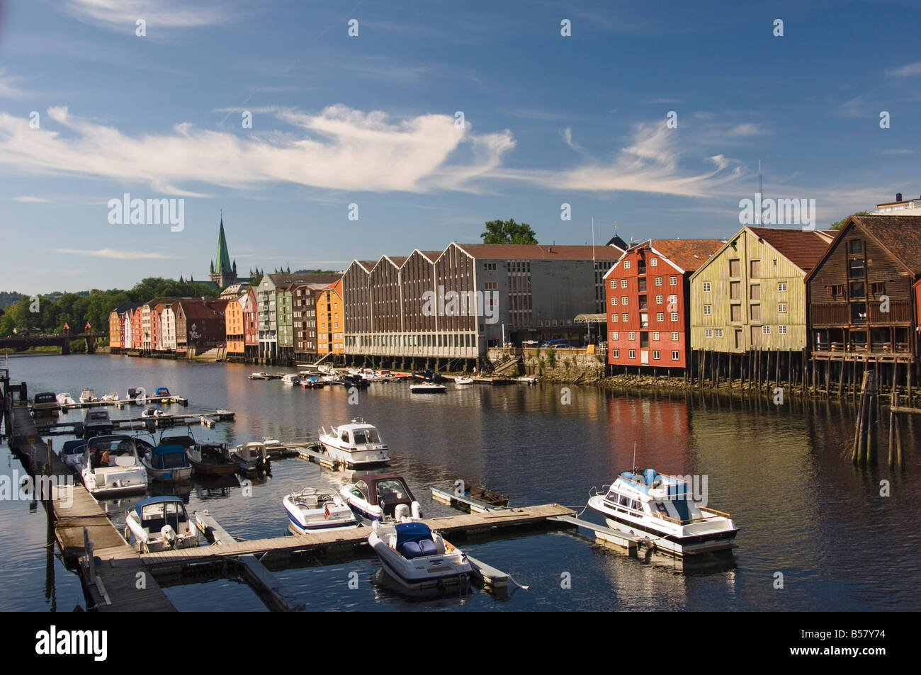 Merchants warehouses and boat moorings along the Nidelva, Trondheim, Norway, Scandinavia, Europe Stock Photo