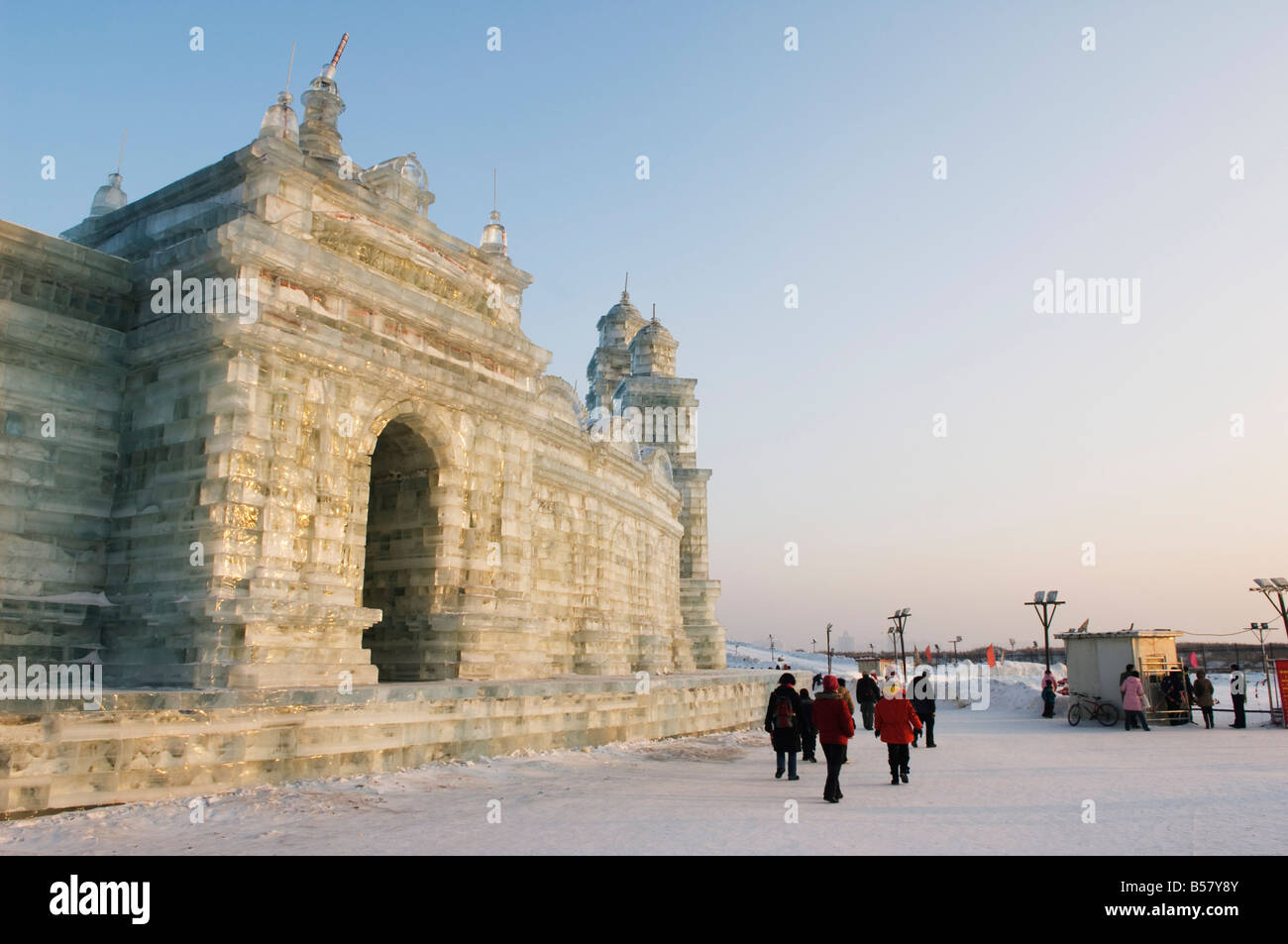 Tourists walking past the snow and Ice Sculptures at the Ice Lantern Festival, Harbin, Heilongjiang Province, China Stock Photo