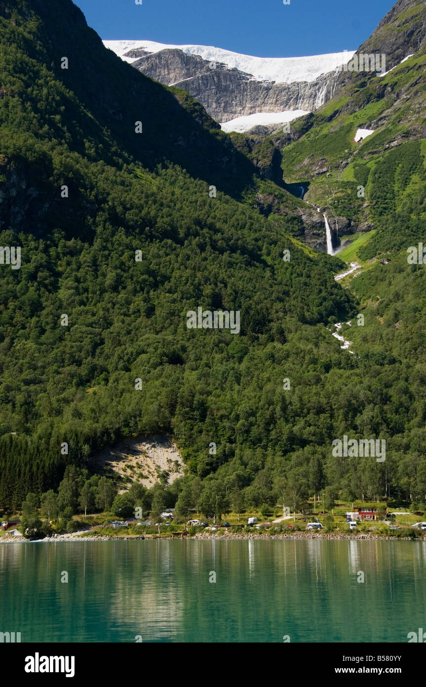 Green lake, waterfall, and glacier above Olden, Fjordland, Norway, Scandinavia, Europe Stock Photo