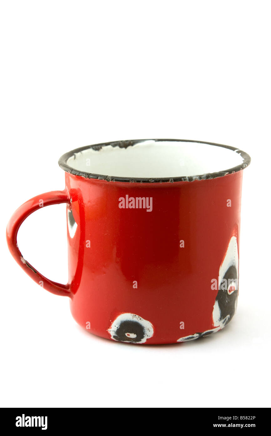 Battered Tin Mug on White Background Stock Photo