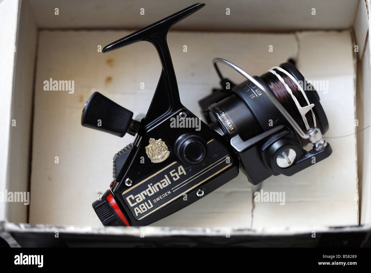 The ABU Cardinal, fixed spool fishing reel Stock Photo - Alamy