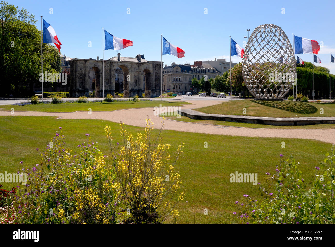 French flags and modern sculpture, Place de la Republique, Reims, Marne, Champagne-Ardenne Stock Photo