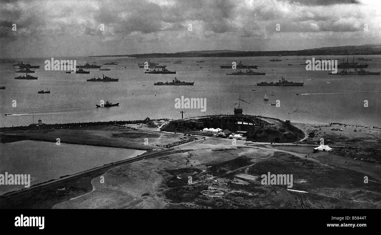 Riding at Anchor - and awaiting the Queen. 15 June 53. Photo shows, today's aerial view of the spithead anchorage, showing several of the units of the fleet, and visiting ships, awaiting the Coronation review by her majesty the Queen. June 1953 P005372 Stock Photo