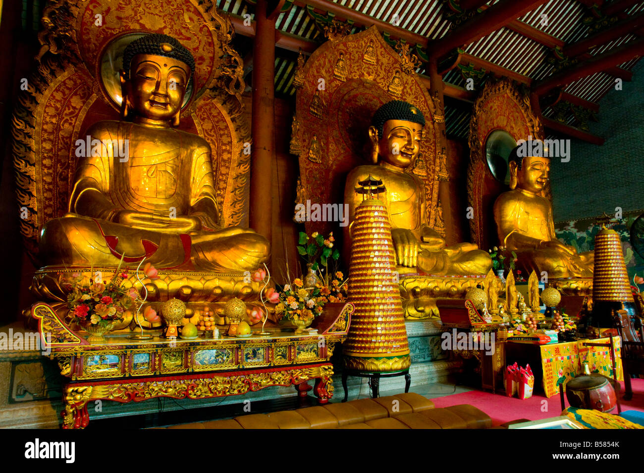 Dafo Buddhist Temple, three statues in interior, Guangzhou (Canton), Guangdong, China, Asia Stock Photo