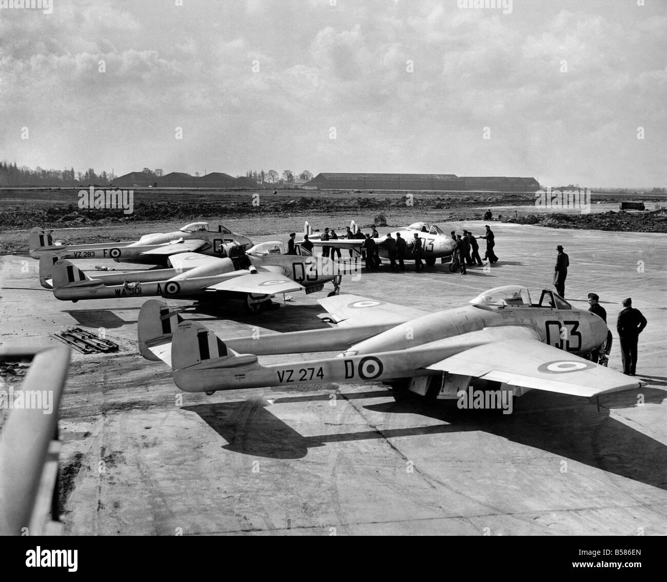 No 613 Squadron (City of Manchester) Royal Auxiliary Air Force was the first Auxiliary Sqadron in the N.W. to go into action under the Governments new scheme for fitting auxiliary sqadrons into the defence programme. Vampire's of the squadron being placed on the tarmac in readiness for flight. April 1951 P004819 Stock Photo