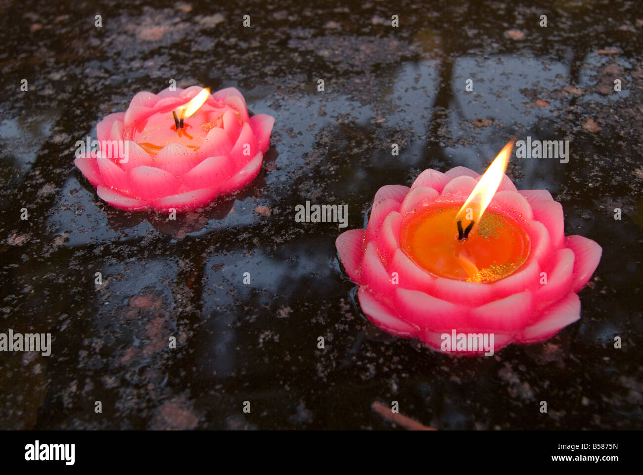 Candle floating in Dafo temple, Leshan, Sichuan, China, Asia Stock Photo