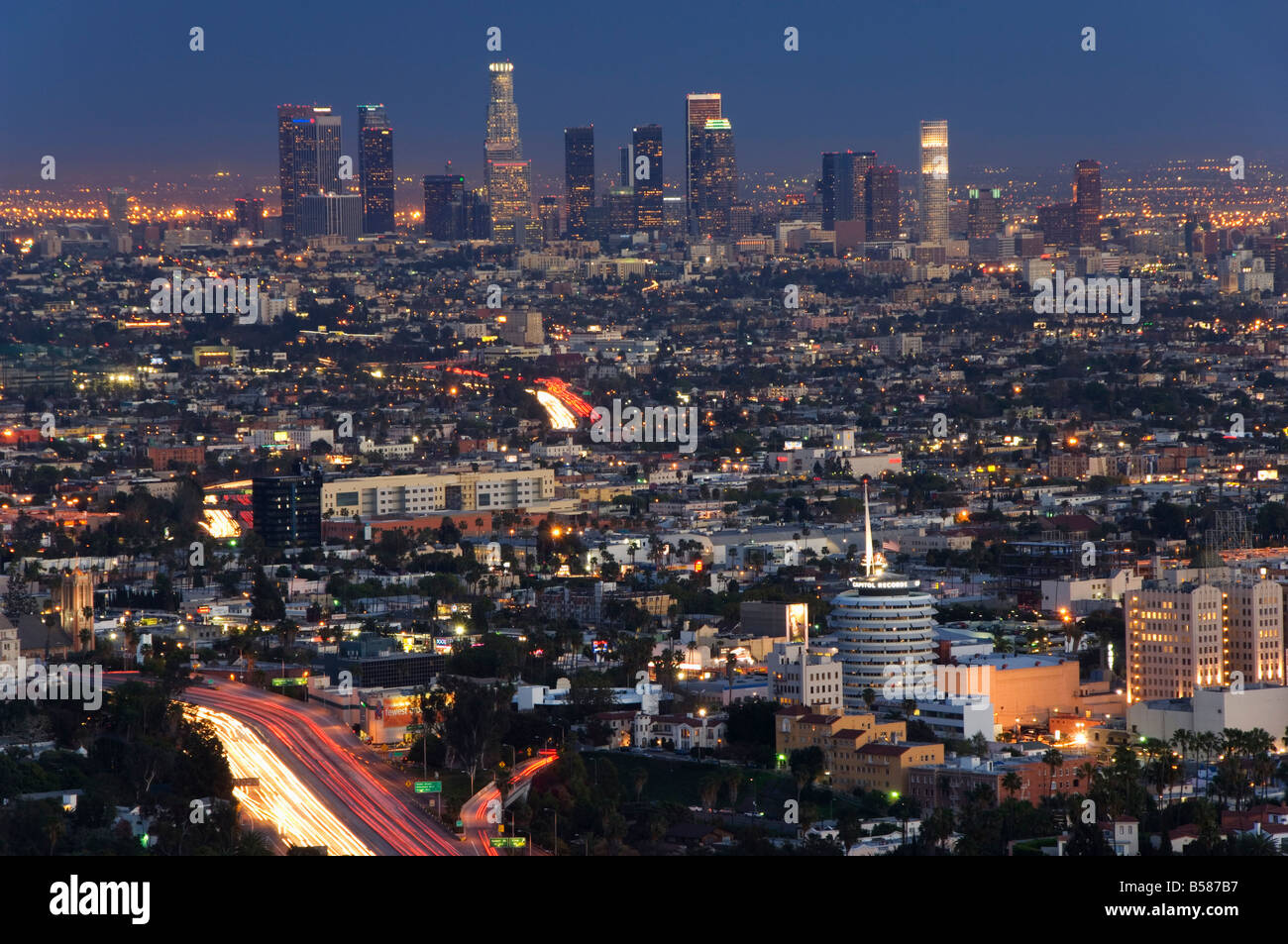 Downtown district skyscrapers and car lights on a city highway, Los Angeles, California, United States of America, North America Stock Photo