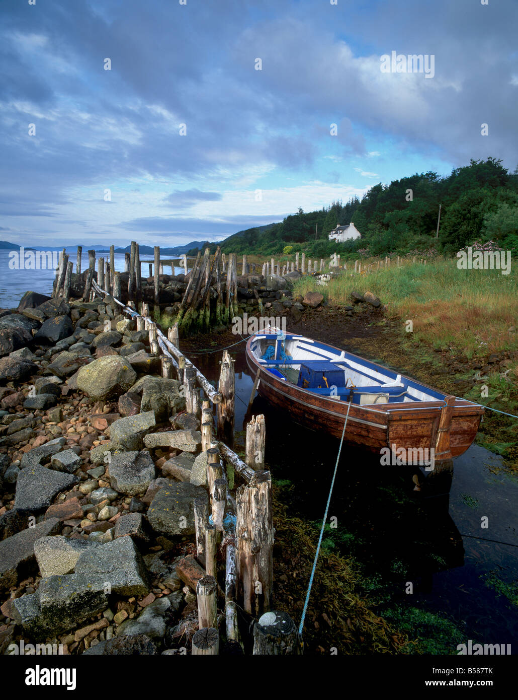 Boat, cottage and Loch Fyne near Furnace, Argyll and Bute, Scotland