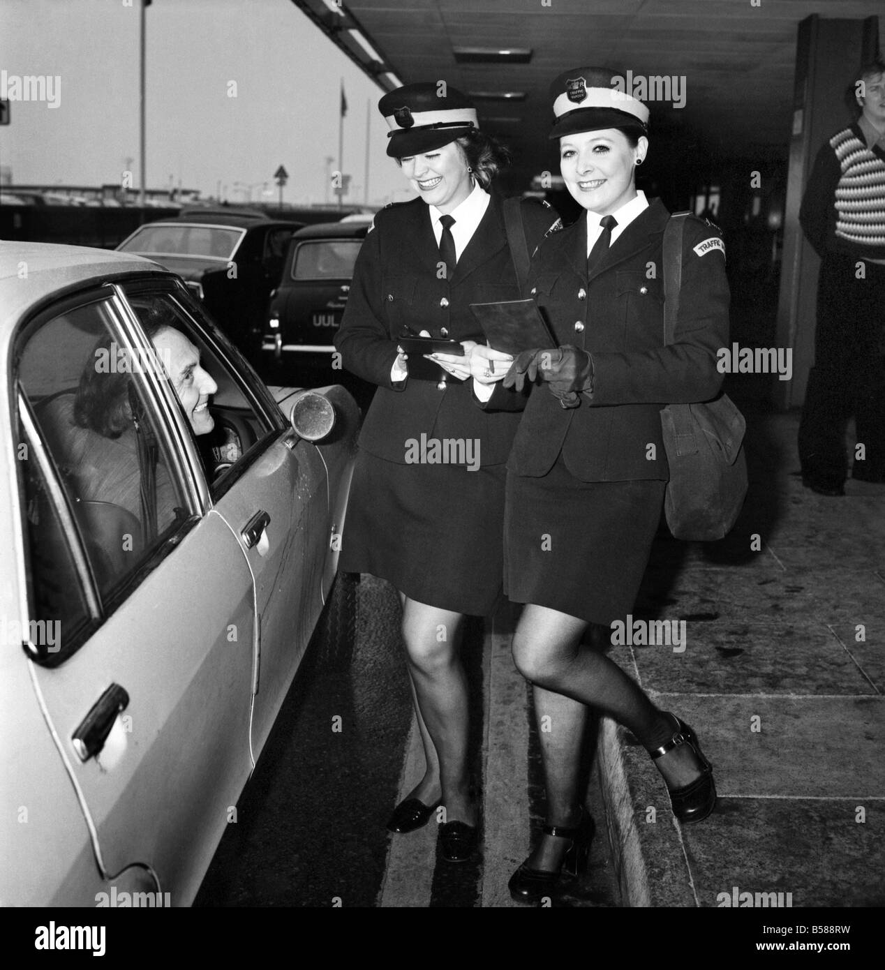 Beauty Queen Traffic Wardens. Travellers St London's Heathrow Airport may have their parking problems eased with cover girl smiles from two ex-model Traffic Wardens. Miss Denise Humphreys and Mrs. Linda Morton, Former beauty queens and models, have been stationed at the Airport since last Autumn. January 1975 75-00661-006 Stock Photo