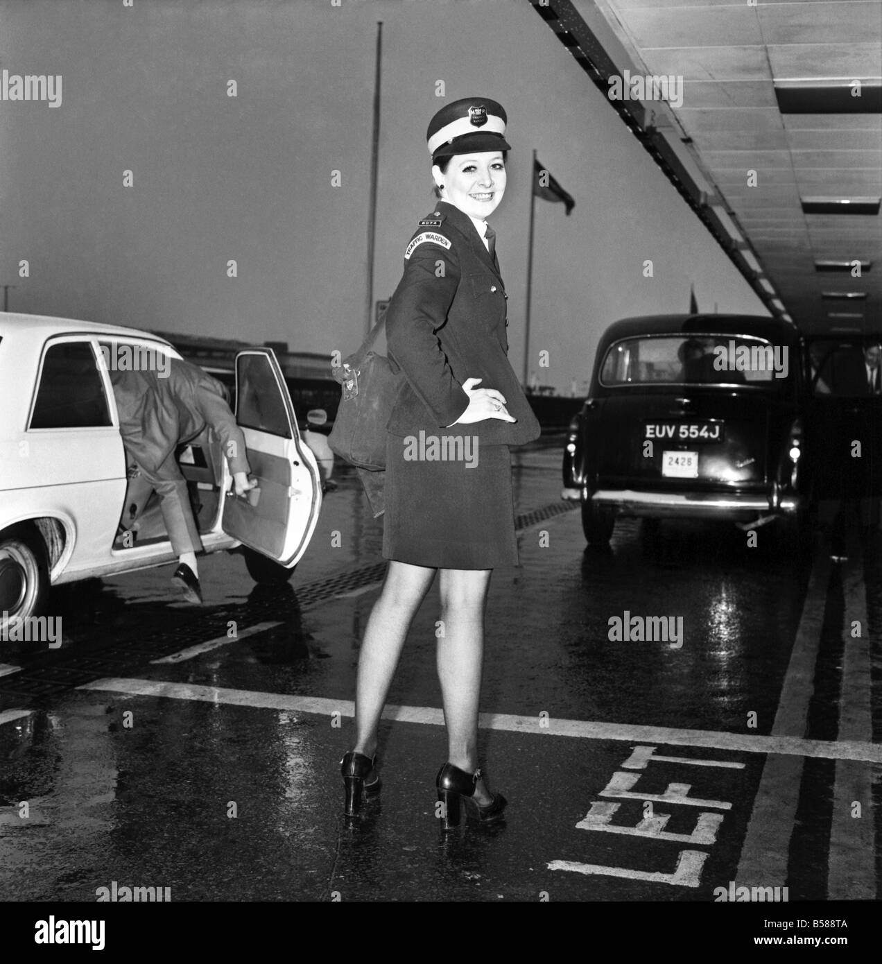 Beauty Queen Traffic Wardens. Travellers St London's Heathrow Airport may have their parking problems eased with cover girl smiles from two ex-model Traffic Wardens. Miss Denise Humphreys and Mrs. Linda Morton, Former beauty queens and models, have been stationed at the Airport since last Autumn. January 1975 75-00661 Stock Photo