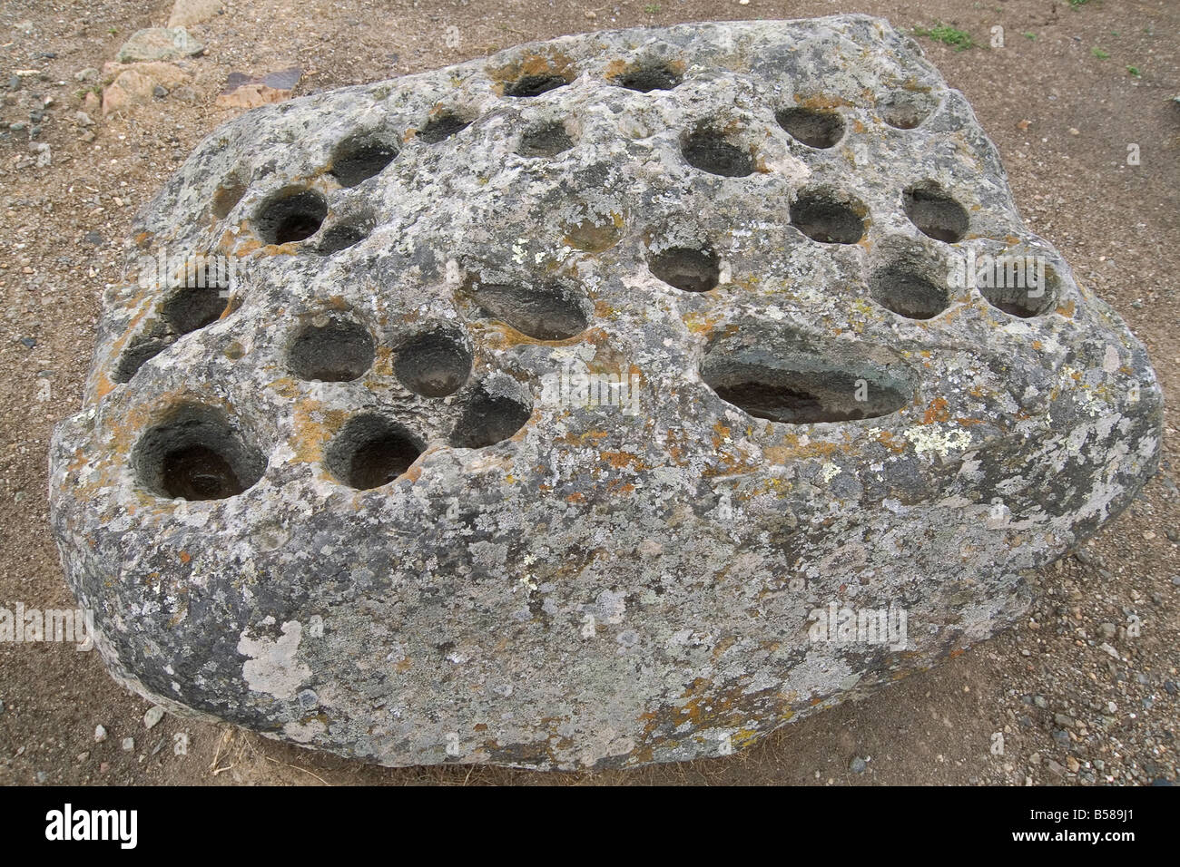 Rock with holes of uncertain use at the most important Inca site in