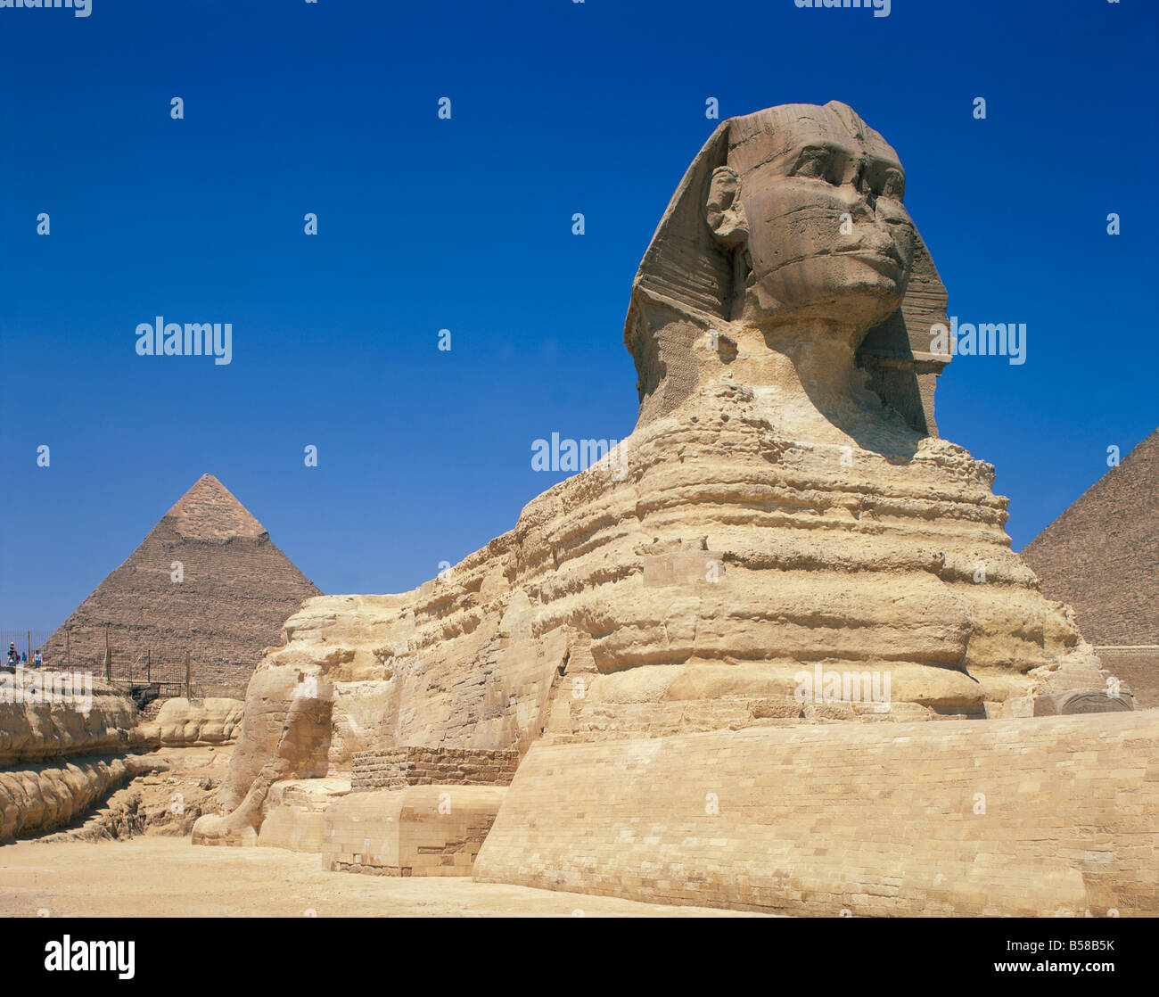 The Great Sphinx and one of the pyramids at Giza UNESCO World Heritage Site Cairo Egypt North