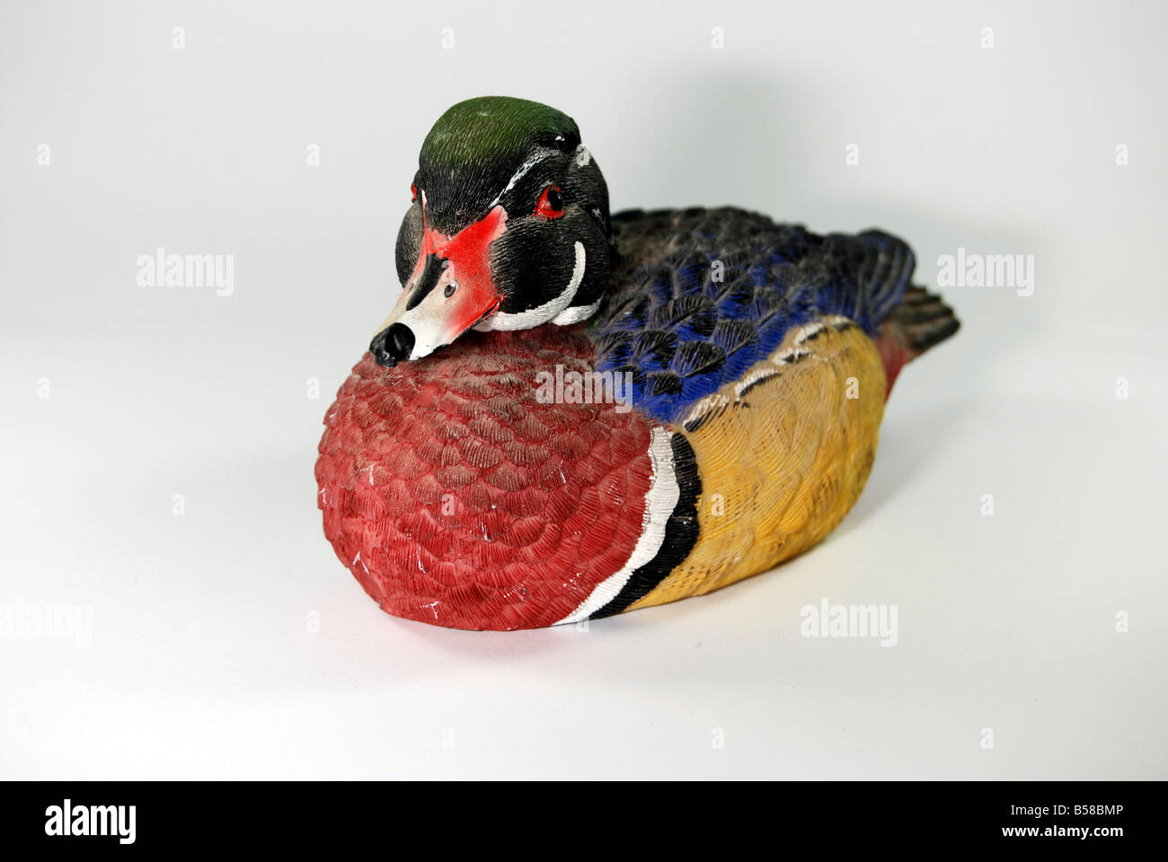 male Mandarin duck figurine on white background Stock Photo Alamy