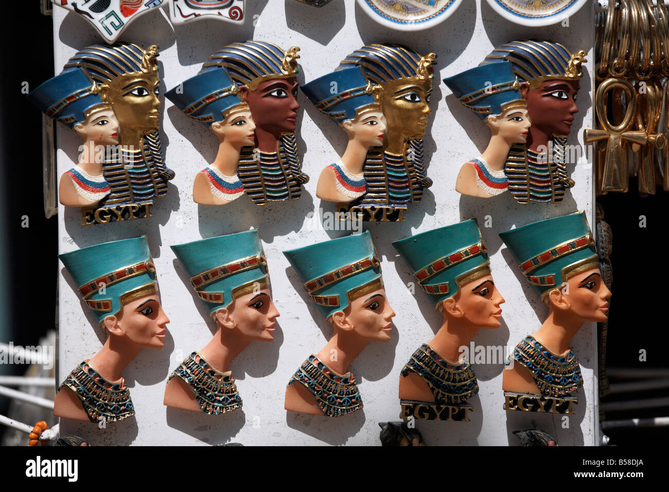 Various Egyptian badges depicting pharaohs, on sale at Aswan Souq, Aswan, Egypt, North Africa, Africa Stock Photo