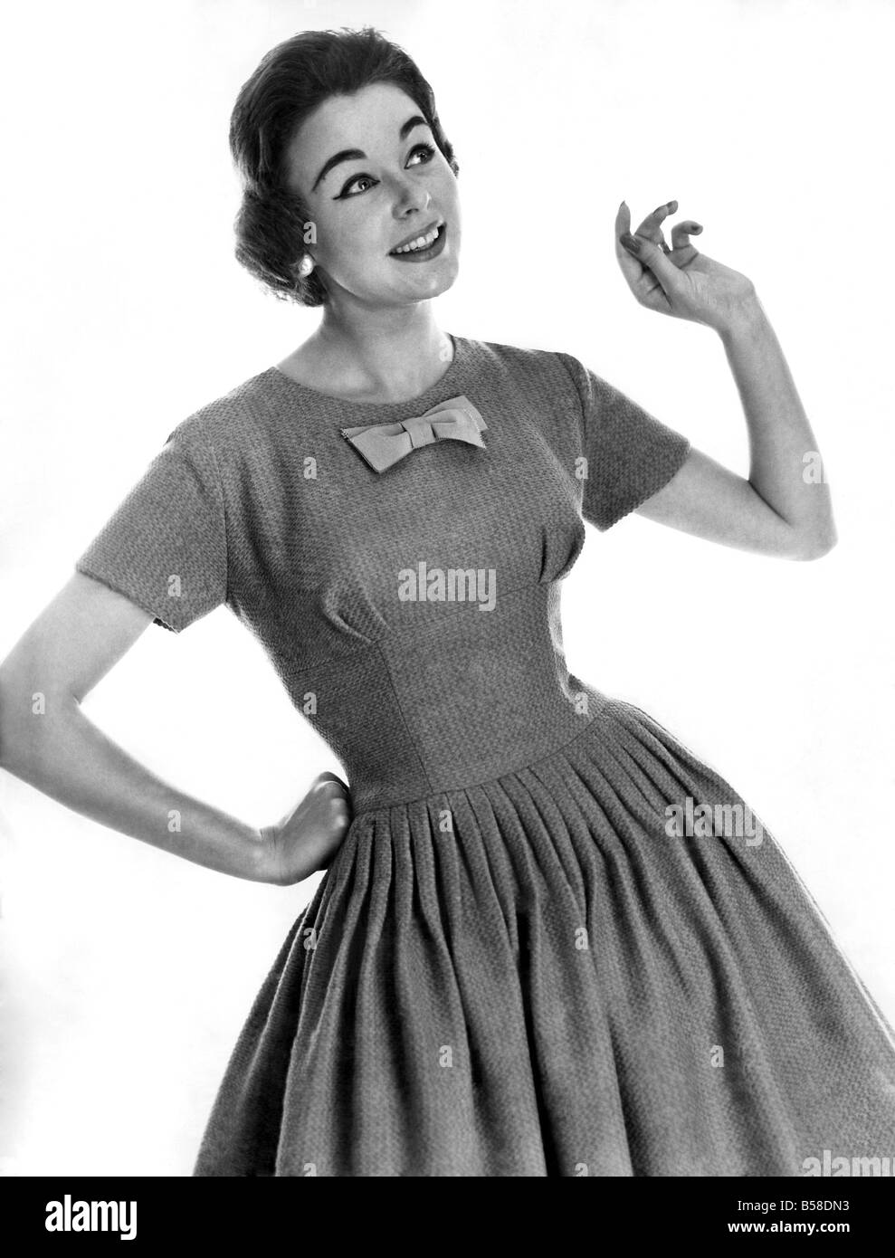 Clothing Fashion Jackie Jackson modelling a knitted dress with bow tie