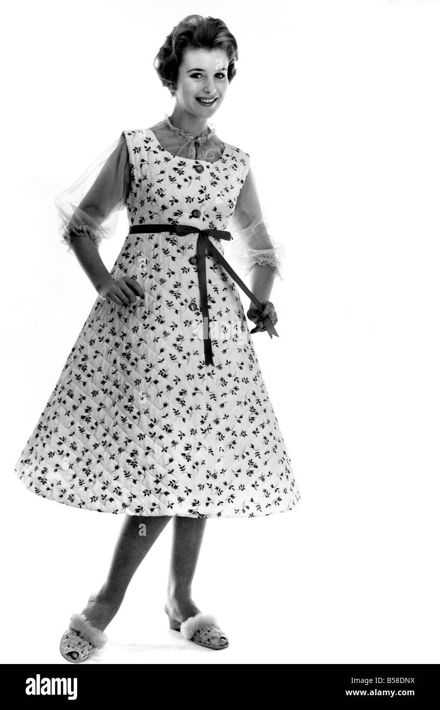 Clothing Fashion. Model wearing a flower print housecoat and slippers.  March 1959 P006925 Stock Photo - Alamy