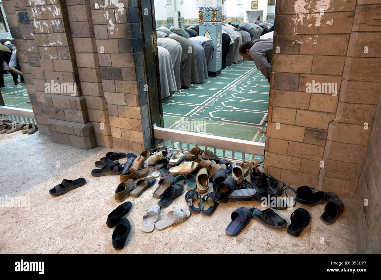 Muslims attend evening prayers at a mosque in Aswan, Egypt, North Africa, Africa Stock Photo