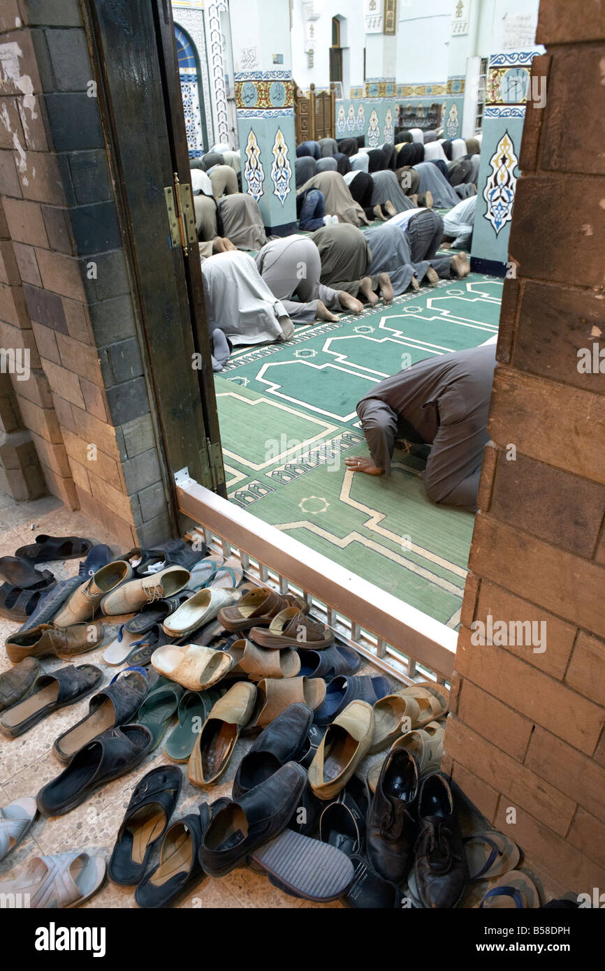 Muslims attend evening prayers at a mosque in Aswan, Egypt, North Africa, Africa Stock Photo