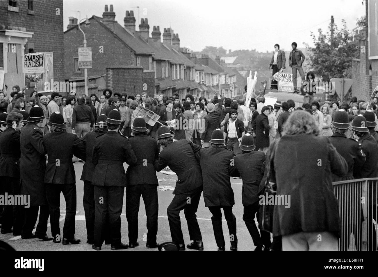 The Birmingham Riots. Police duck as missiles are thrown at the ...