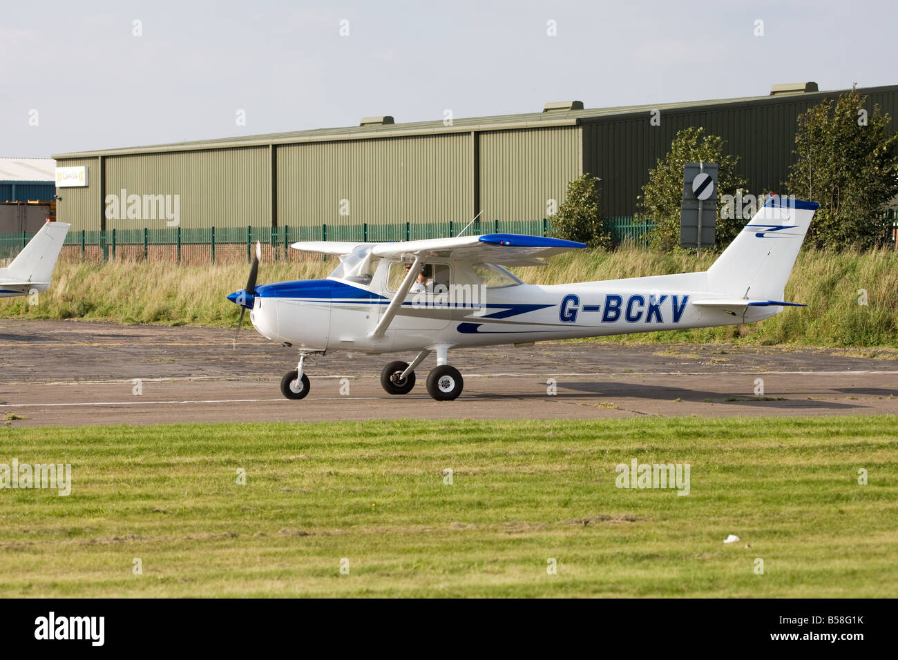 Reims Cessna FRA150L Aerobat G-BCKV lining-up on runway to take-off at Sandtoft Airfield Stock Photo
