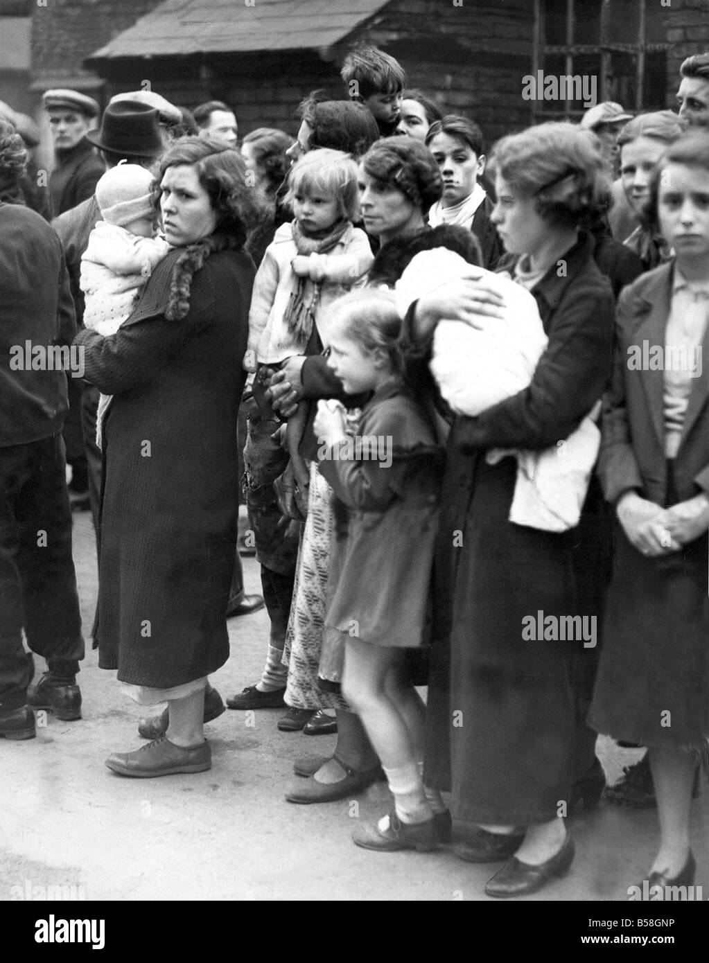 Explosion at Markham Colliery near Chesterfield claimed the lives of 72 men This picture shows women waiting in an agony of suspense to hear if their men are among the victims Stock Photo