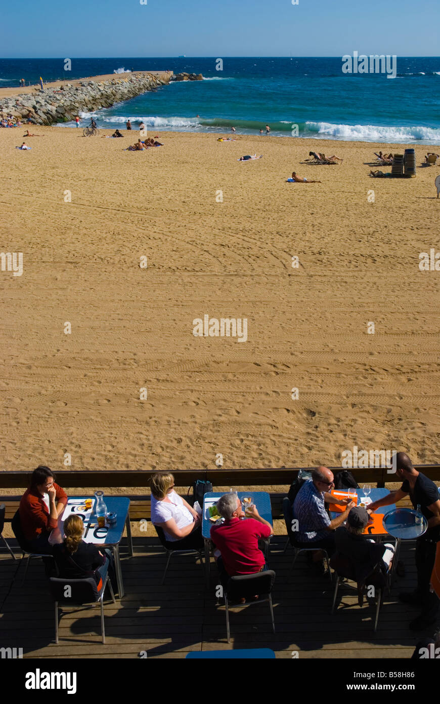 People In A Restaurant At Platja De La Barceloneta Beach In