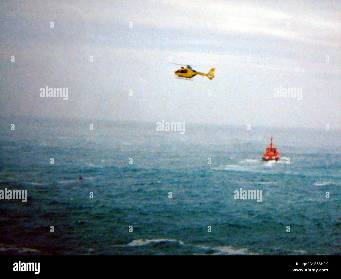 Picture of the rescue opperation underway at Tossa De Mar on Spain s Costa Brava where Symon Howlett was taking photographs of his two sons when a large wave knocked the boys off rocks Mr Howlett 32 of Market Drayton Shropshire dived in and saved his son Thomas 7 but he and younger son Jay were swept out to sea and drowned Stock Photo