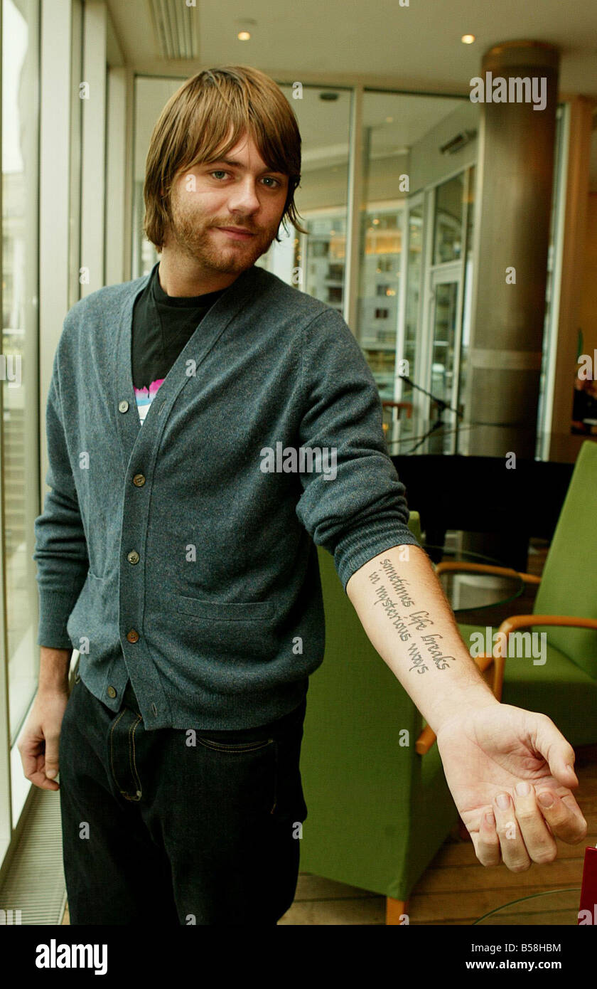 Brian McFadden of Westlife pictured in London with his new tattoo Stock Photo