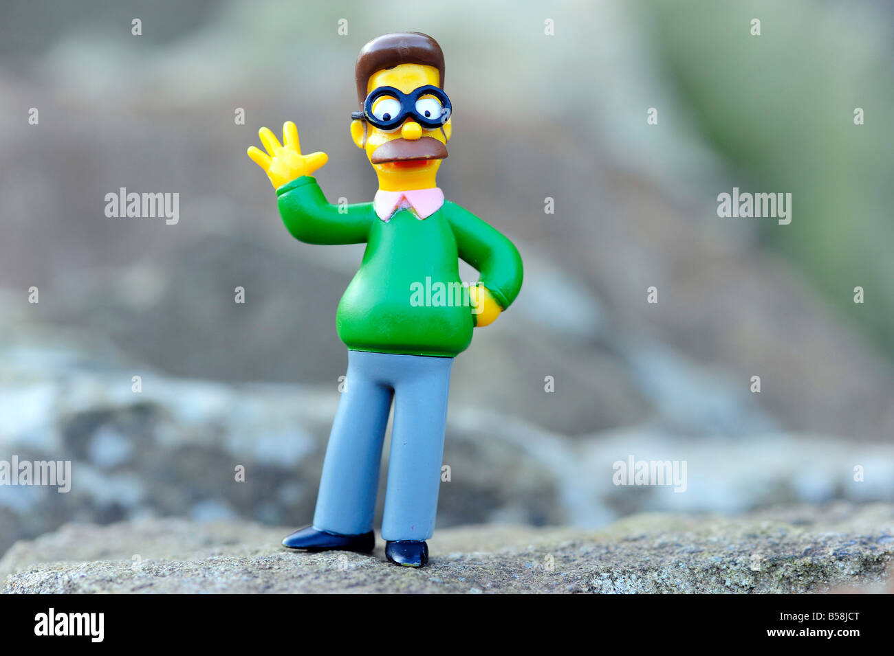ned flanders simpsons homer's neighbour christian american character wave spectacles glasses man male usa toy model dweeb geek Stock Photo