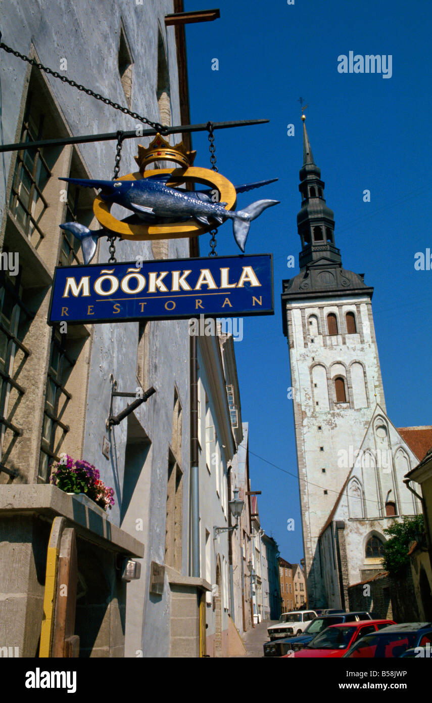 Sign for the Mookkala Restaurant with the Niguliste Church behind Old Town Tallinn Estonia Baltic States Europe Stock Photo