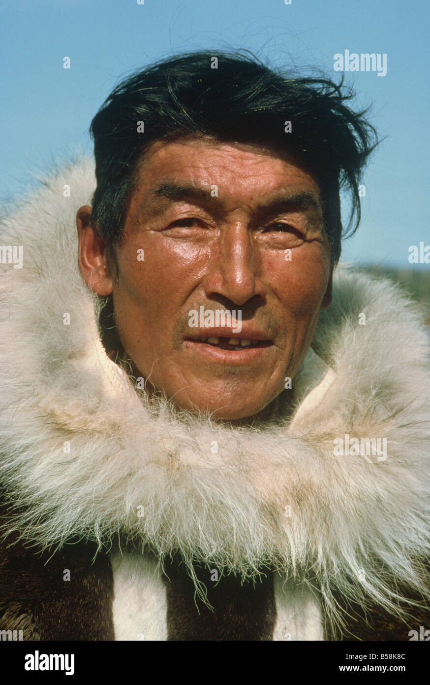 Portrait of Eskimo man wearing caribou skin, Spence Bay, Boothia