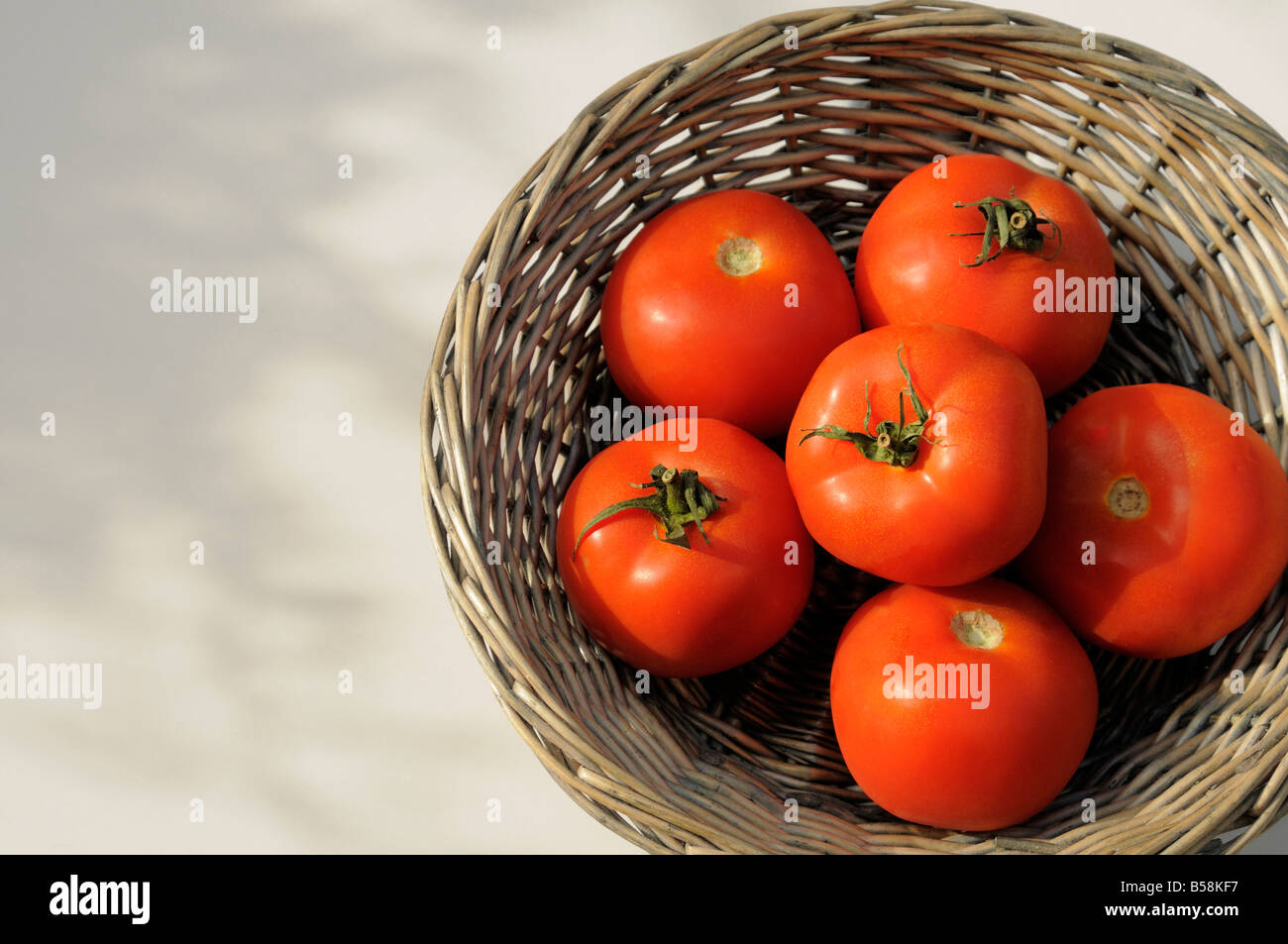 Basket of tomatoes Stock Photo