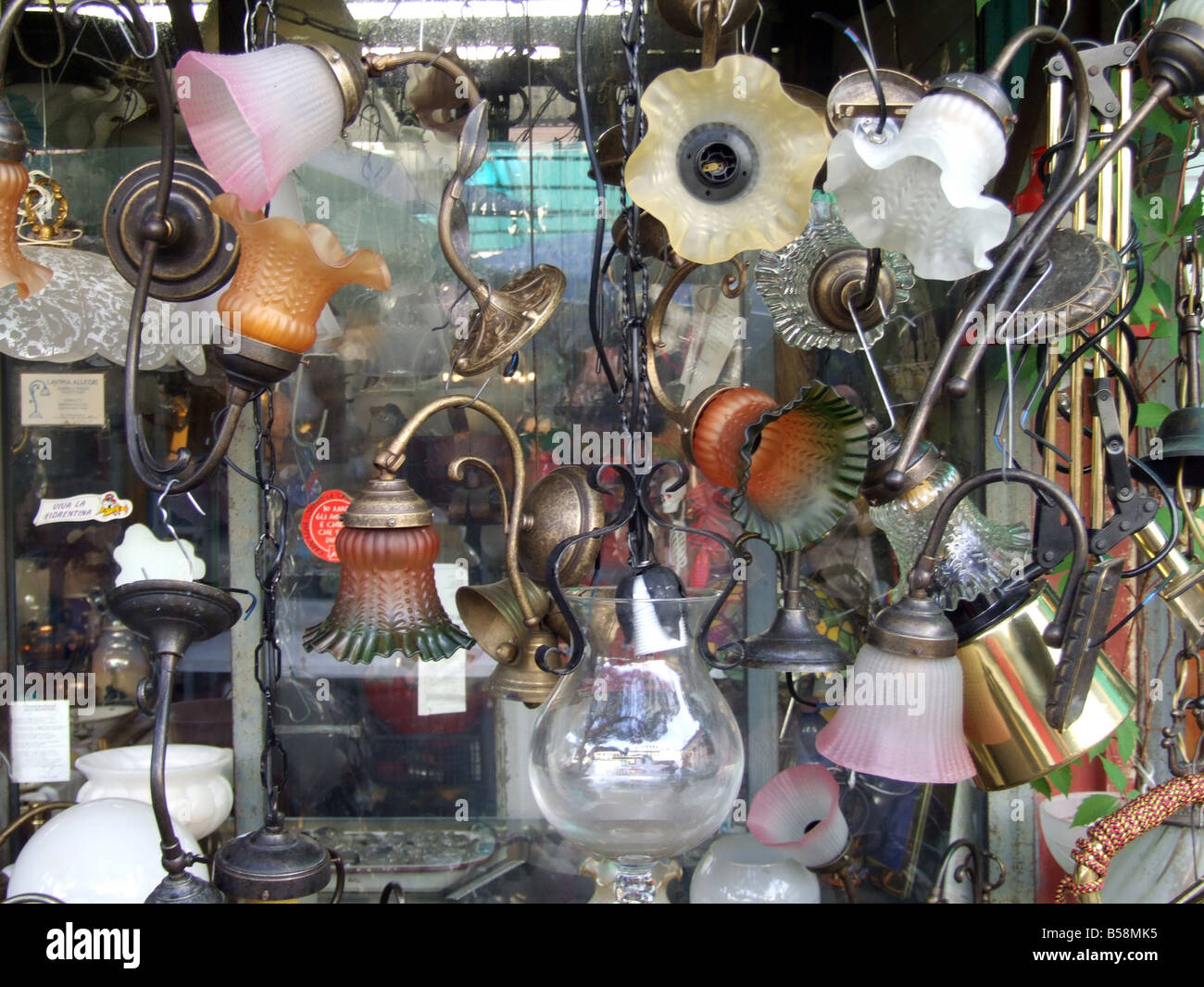 lots old used second hand lamps for in antiques Stock Photo - Alamy