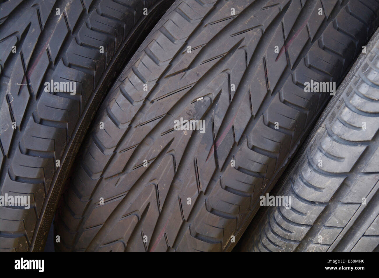 stack of used car wheels Stock Photo Alamy