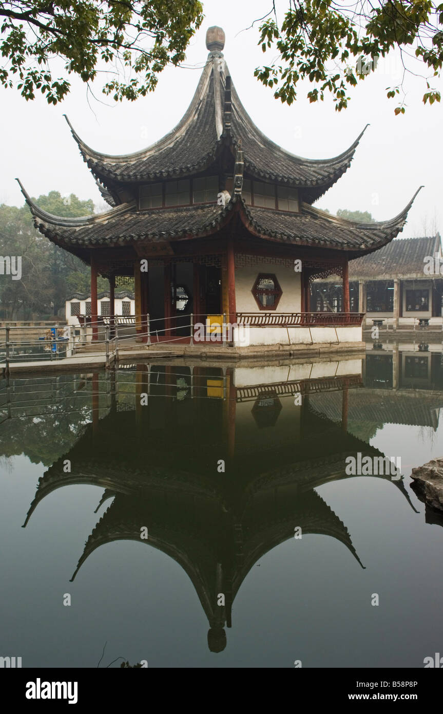 A pagoda reflected in the water at West Garden Buddhist Temple, Suzhou, Jiangsu Province, China Stock Photo