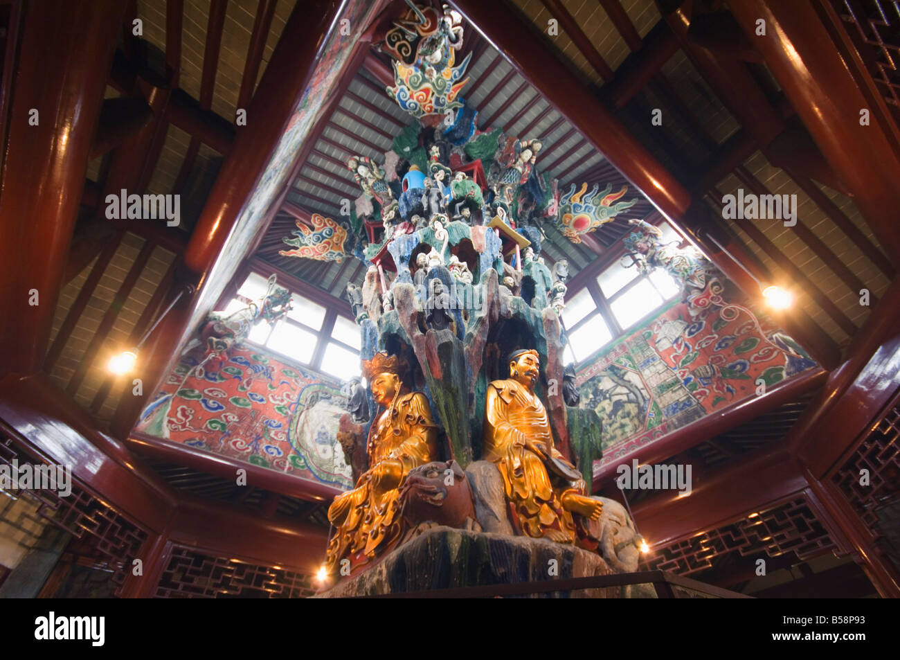 The decorated ceiling and golden statues at West Garden Buddhist Temple, Suzhou, Jiangsu Province, China Stock Photo