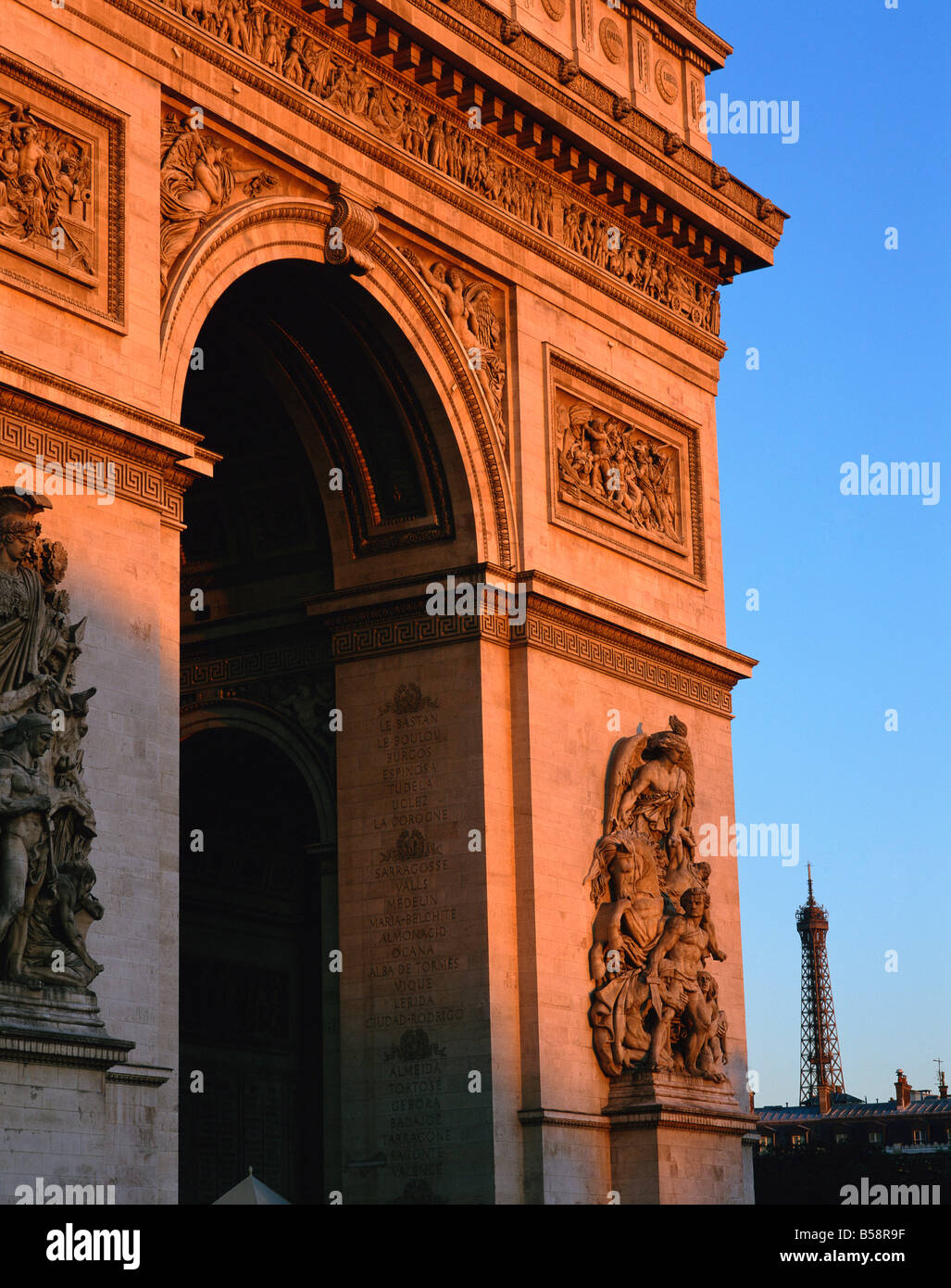 The Arc de Triomphe at dusk with the Eiffel Tower behind Paris France Europe Stock Photo Alamy