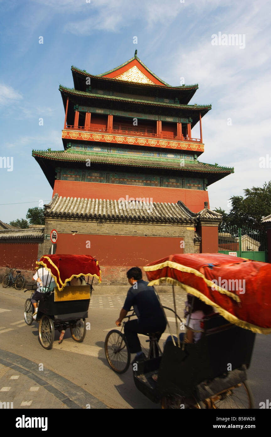 Rickshaw at the Drum Tower, a Ming dynasty version originally marking the centre of the old Mongol capital, Beijing, China Stock Photo
