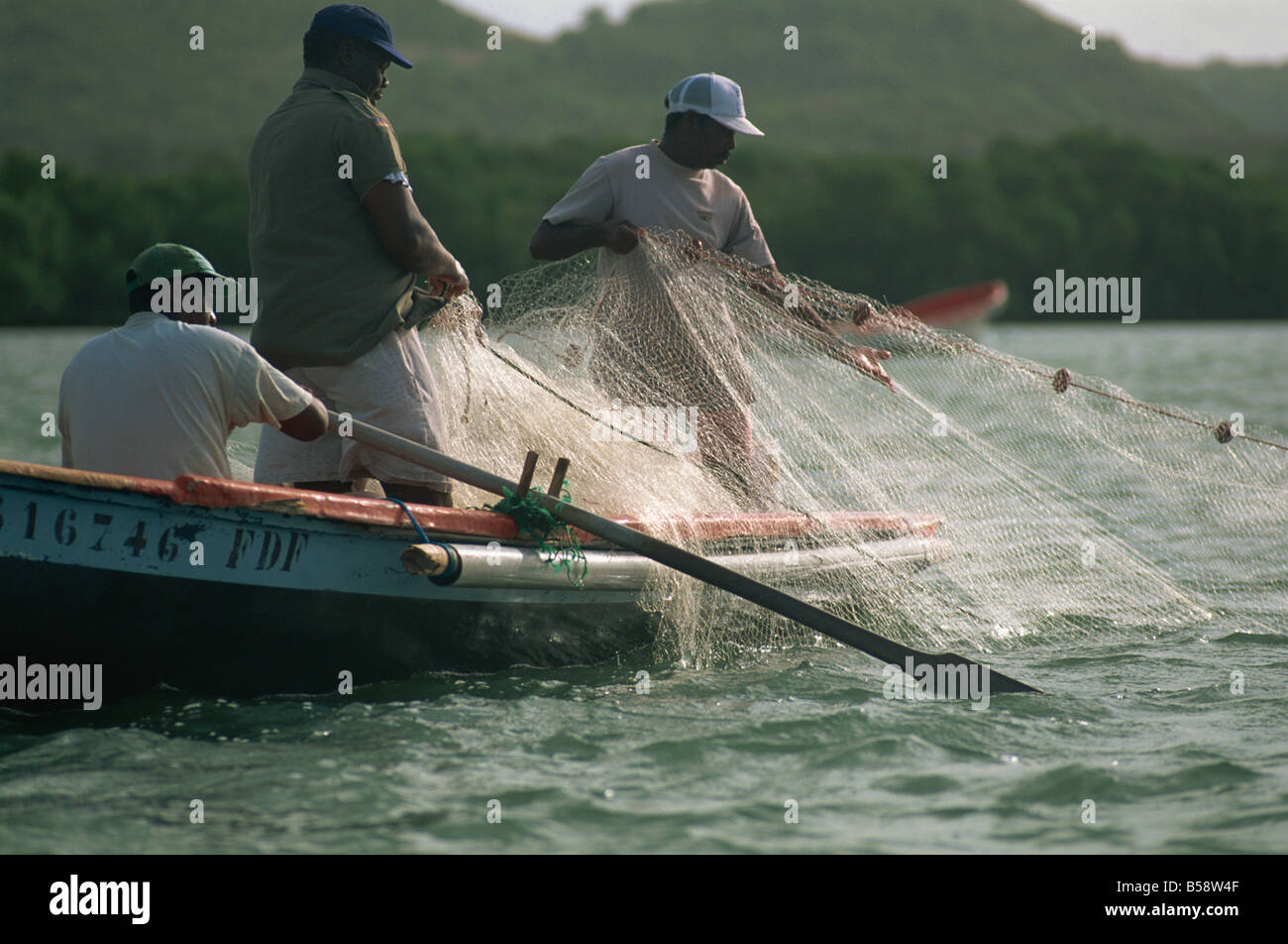 Drawing in fishing nets, Baie des Anglais, Martinique, West Indies, Caribbean, Central America Stock Photo