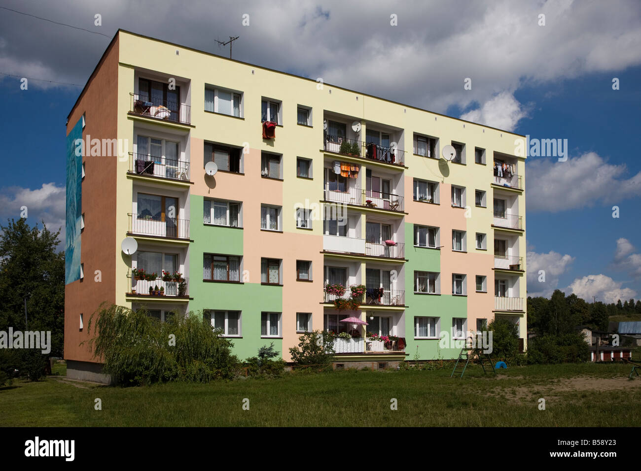 Brightly painted block of flats on housing estate Miastko Poland Stock Photo