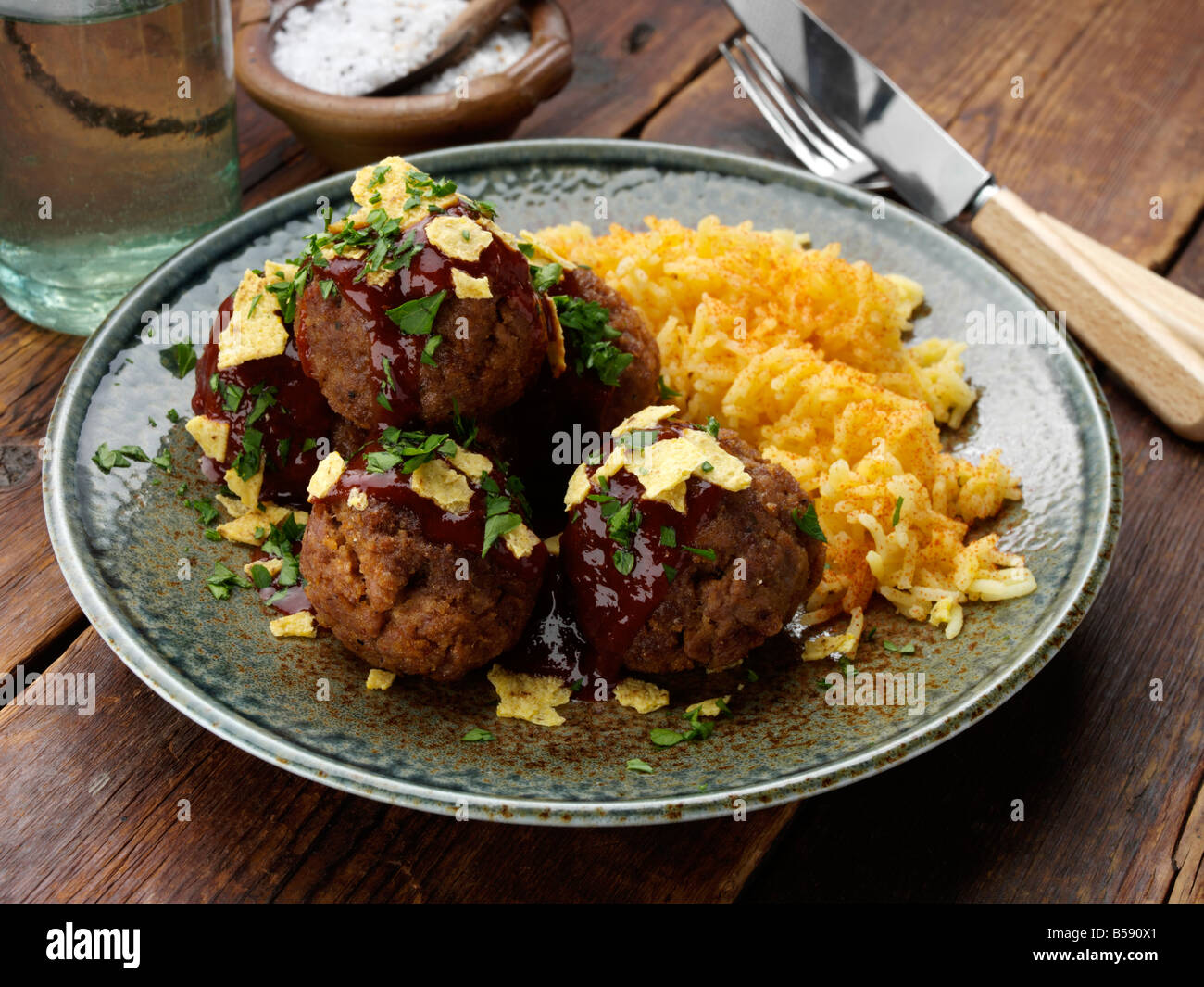Individual portion bbq meatballs saffron rice hires stock photography