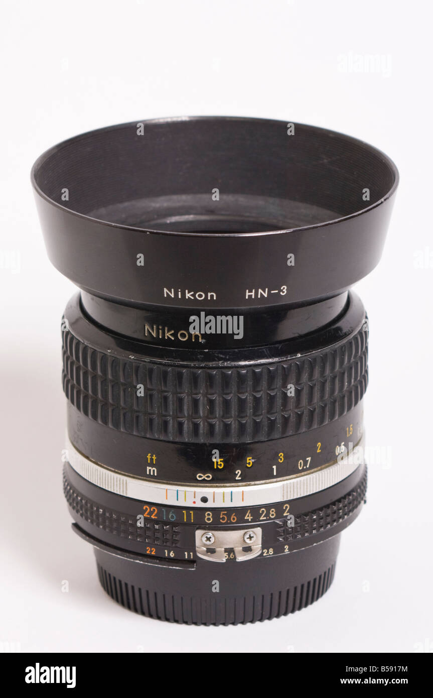A Nikon 35mm f2 ais Nikkor wide angle manual focus lens with hn-3 lens hood  attatched for Nikon 35mm slr film cameras Stock Photo - Alamy